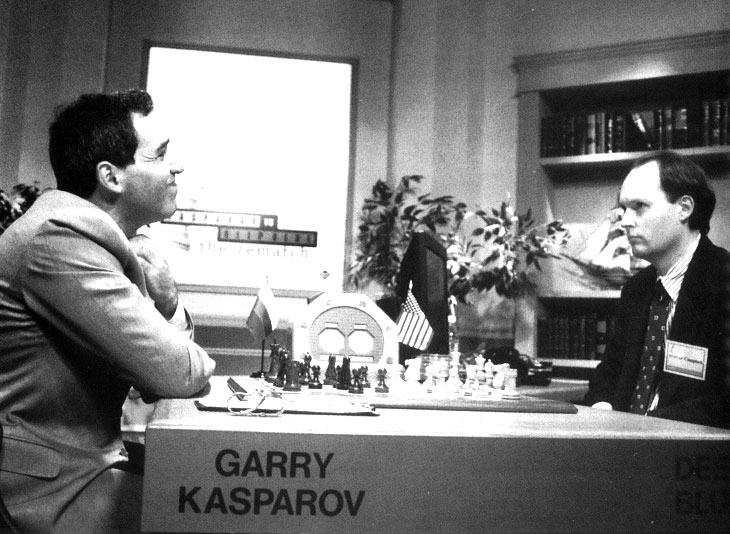 Kasparov grins